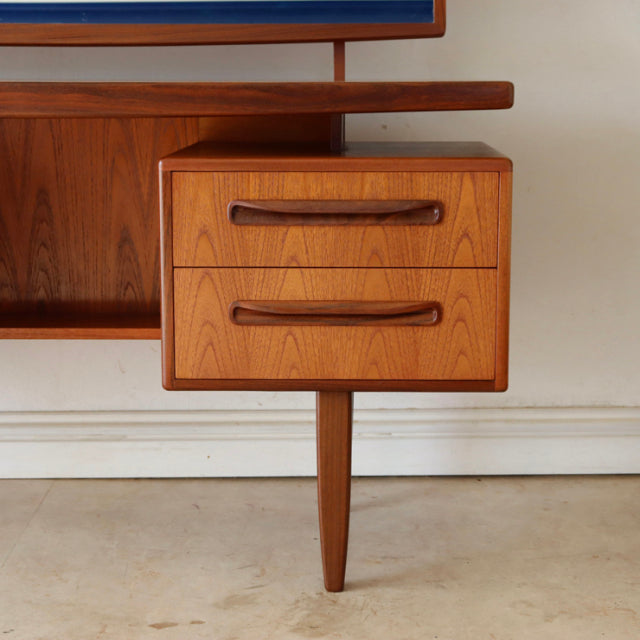 Vintage teak G-Plan mid-century desk drawer with smooth wood grain and tapered leg, British design inspired by Denmark style.