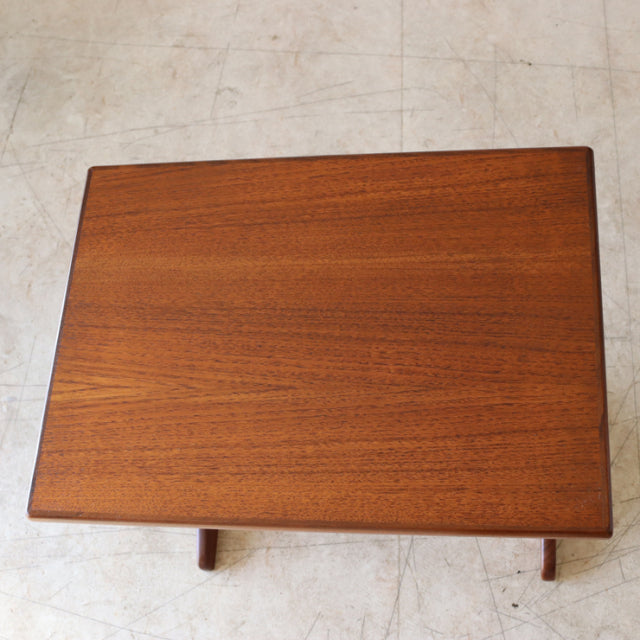 Vintage teak G-Plan nesting table with rich wood grain and simple mid-century British design.