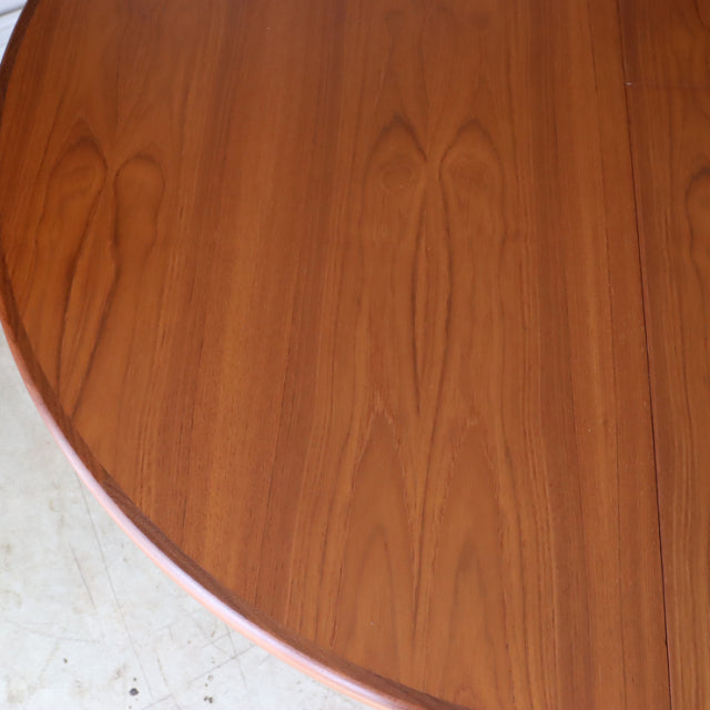 Oval vintage teak dining table top with rich wood grain, mid-century British G-PLAN design from Denmark.