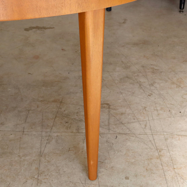 Mid-century vintage teak dining table leg with smooth wood grain and tapered British-Denmark design.