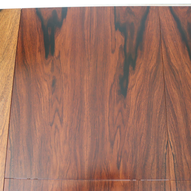 Vintage McIntosh teak dining table top showcasing rich wood grain with mid-century British and Danish design influences.