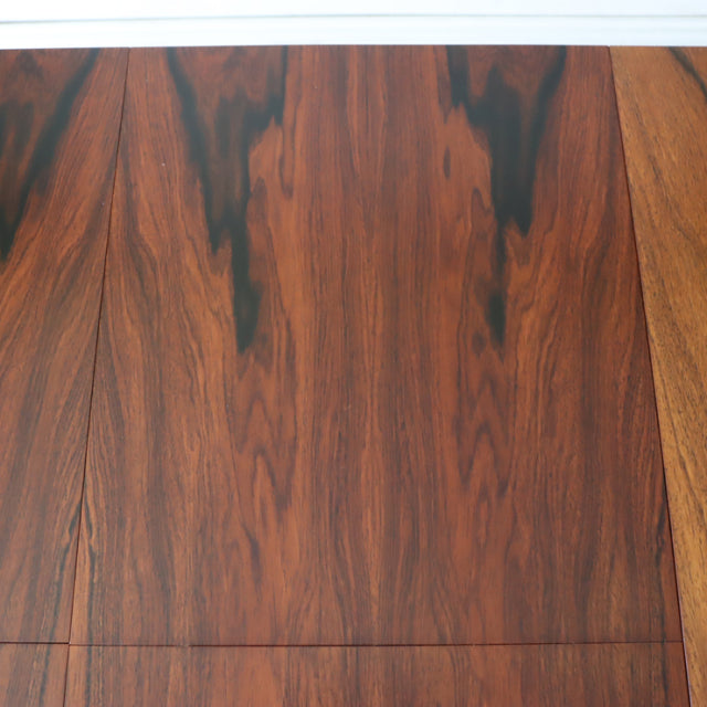 Vintage teak dining table top with rich wood grain from British mid-century McIntosh design, rectangular form.