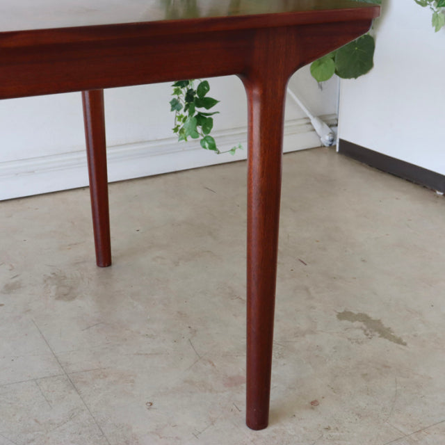 Mid-century vintage teak dining table leg with smooth grain and tapered British-Denmark design.