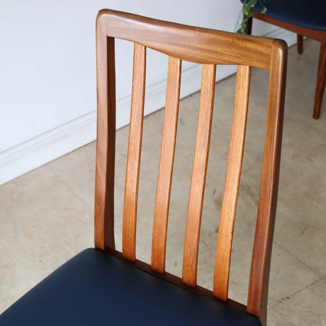 Vintage British mid-century teak dining chair from G-PLAN Fresco series with vertical slatted back and dark navy upholstered .