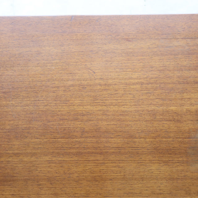 Vintage British G-Plan mid-century teak coffee table top showing rich wood grain and smooth finish.