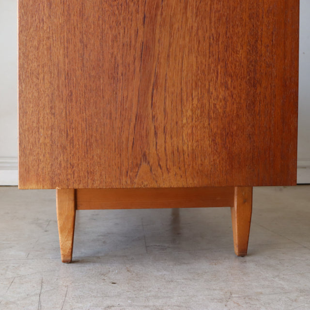 Vintage teak storage box by Sutcliffe of Todmorden with mid-century British design, tapered legs, and visible wood grain.
