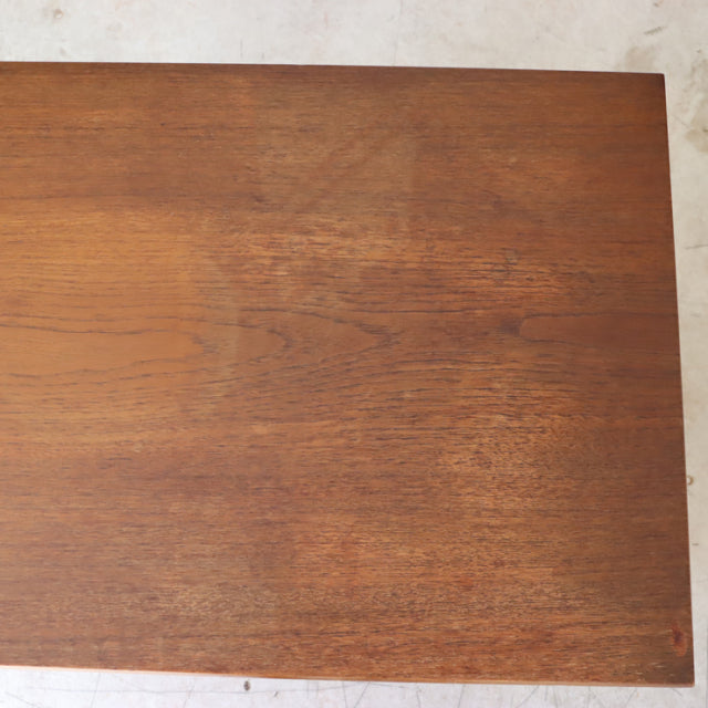 Vintage teak wood surface with rich grain pattern from British Sutcliffe of Todmorden mid-century box.