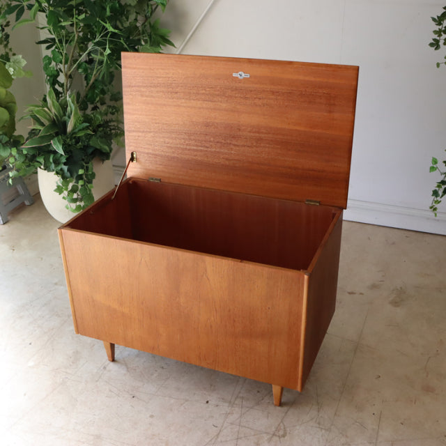 Vintage teak storage box by Sutcliffe of Todmorden, British mid-century design with clean wood grain and tapered legs.