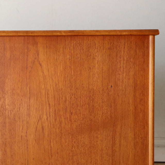 Vintage teak storage box by Sutcliffe of Todmorden with smooth wood grain and minimalist mid-century British design.