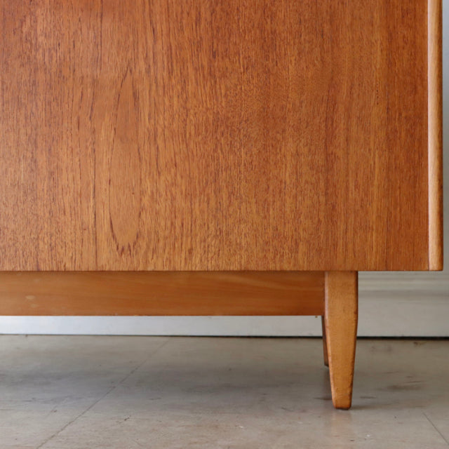 Mid-century vintage teak storage box leg and wood grain detail by Sutcliffe of Todmorden, British design with clean lines.