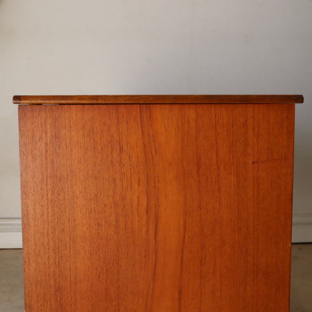 Vintage teak storage box by Sutcliffe of Todmorden with smooth wood grain and mid-century British design.