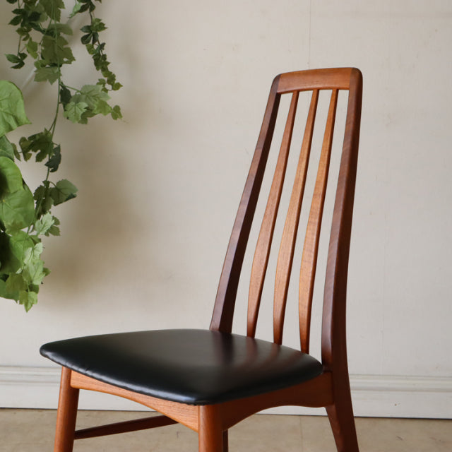 Mid-century vintage teak dining chair by KOEFOEDS HORNSLET, Denmark, black leather seat, slender vertical slat back, tapered .