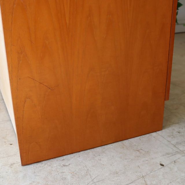Vintage British mid-century McIntosh teak sideboard with smooth wood grain and clean lines.