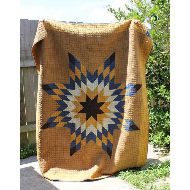 Camel patchwork quilt cover featuring a vintage star pattern with navy, beige, and cream tones, handmade style inspired by.