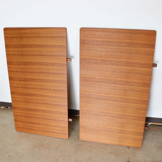 Pair of vintage mid-century teak dining table leaves with fine wood grain and smooth edges, Danish design.