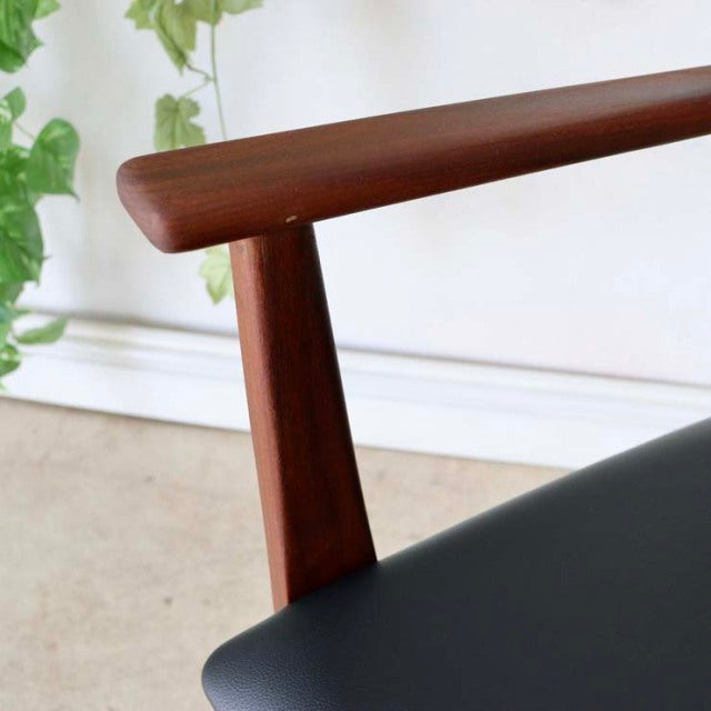 Vintage teak armrest with smooth grain and mid-century British-Danish design by Younger.