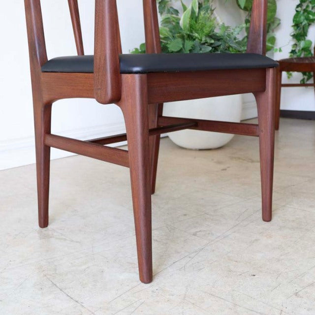 Vintage teak dining chair by Younger with British mid-century design, featuring slender tapered legs and smooth armrests.