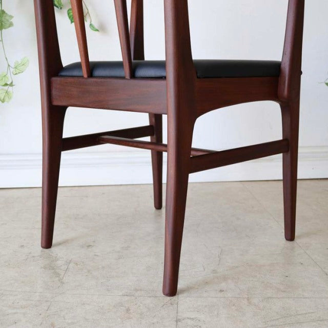 Vintage teak dining chair by Younger with British mid-century design, slender legs and visible wood grain.