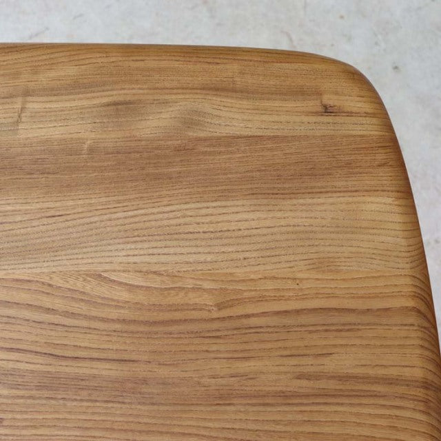 Mid-century British vintage Arcol dining table top in warm teak with smooth rounded edges and visible wood grain.