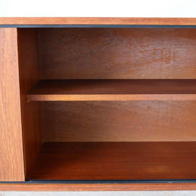 Vintage teak AVALON lowboard with smooth wood grain and mid-century British design, open shelving visible.