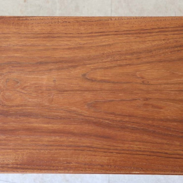 Vintage Avalon teak lowboard showcasing rich wood grain and sleek mid-century British design from Denmark.