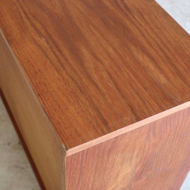British vintage AVALON teak lowboard with smooth wood grain and clean mid-century lines.