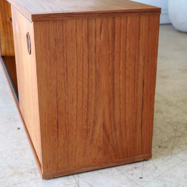 Vintage mid-century teak lowboard by Avalon, British design with clean lines and rich wood grain detailing.