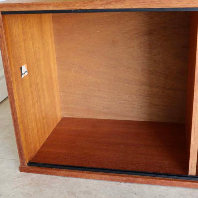 Vintage teak veneer interior of mid-century Avalon lowboard cabinet with smooth wood grain and subtle patina.