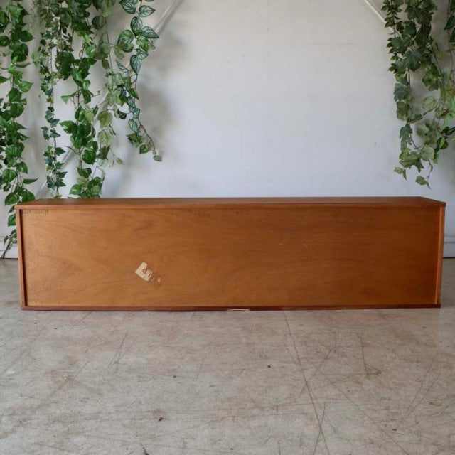 Vintage teak lowboard by Avalon with mid-century British design, clean lines, and visible wood grain.
