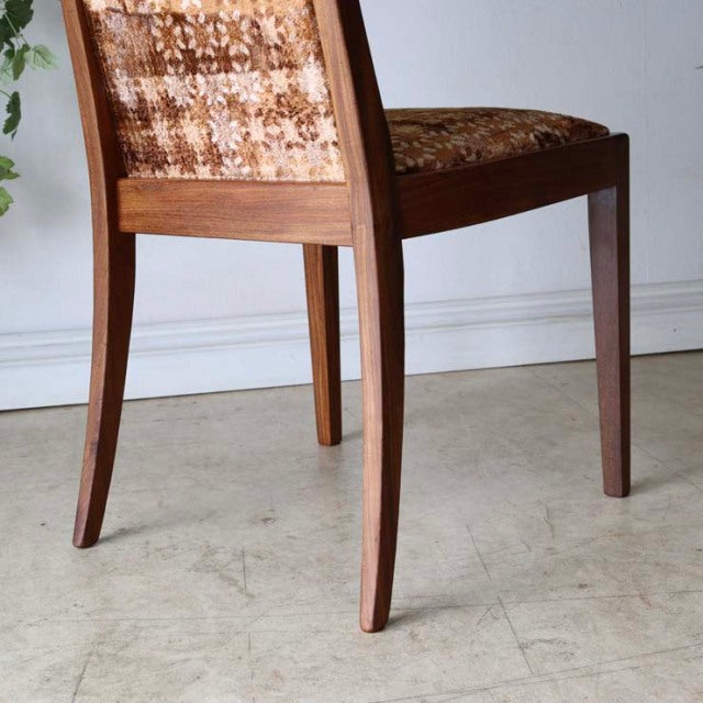 Set of four vintage British G-Plan dining chairs in teak with mid-century legs and patterned fabric backs, inspired by.