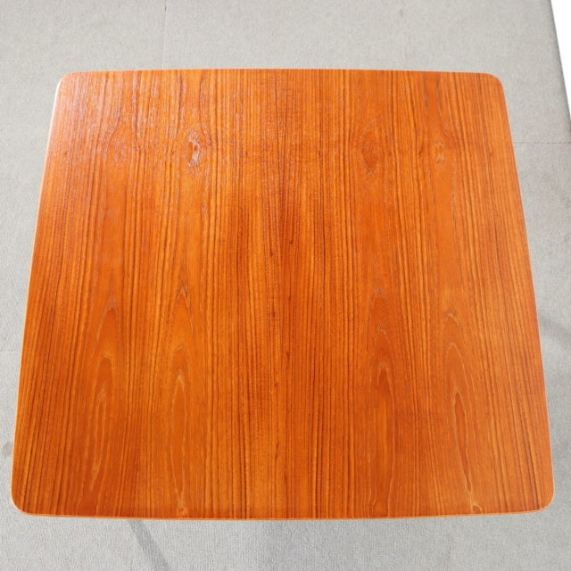 Square mid-century teak coffee table top with rich wood grain and rounded edges, showcasing British-Denmark vintage style.