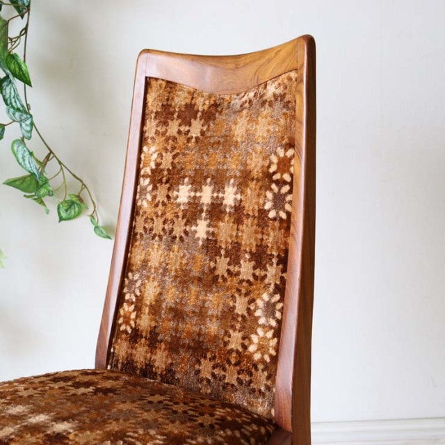 Vintage G-Plan dining chair with teak frame and patterned mid-century British upholstery, slim wooden legs.