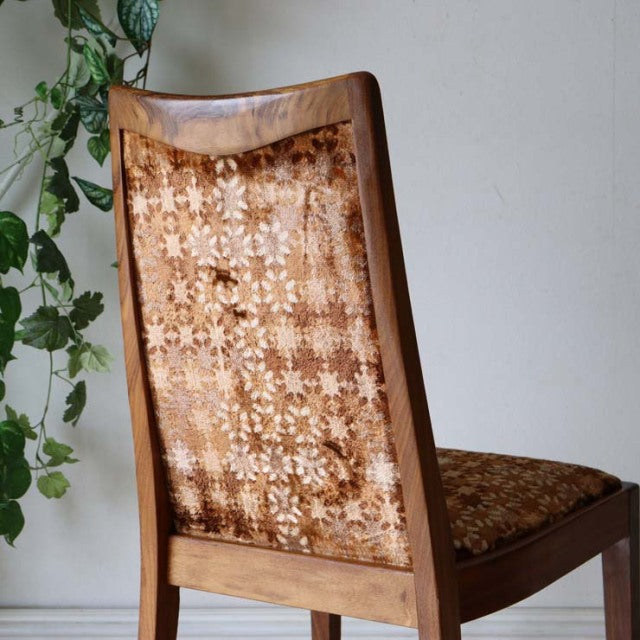 Vintage G-PLAN teak dining chair with mid-century British design, patterned fabric backrest and seat, smooth wood grain.