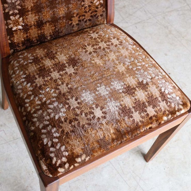 Vintage teak G-Plan dining chair seat with brown floral-patterned mid-century fabric and wooden legs.