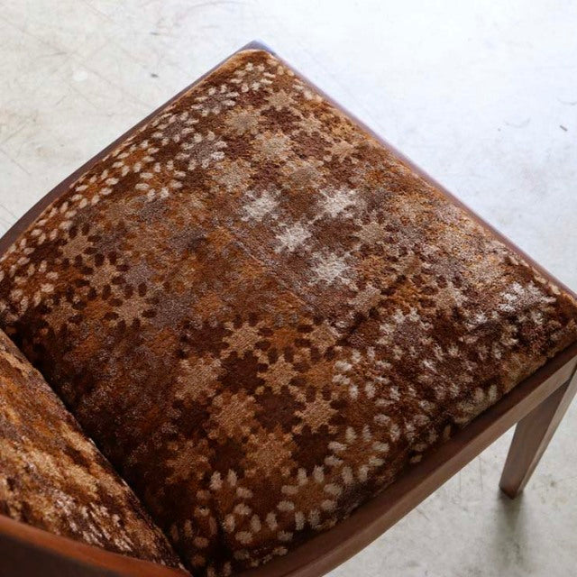 Vintage G-Plan dining chair set in teak with mid-century British design and textured brown patterned upholstery from Denmark.