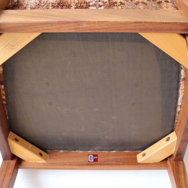 Underside view of vintage G-Plan teak dining chair from British mid-century Denmark collection, showing solid wood frame and .