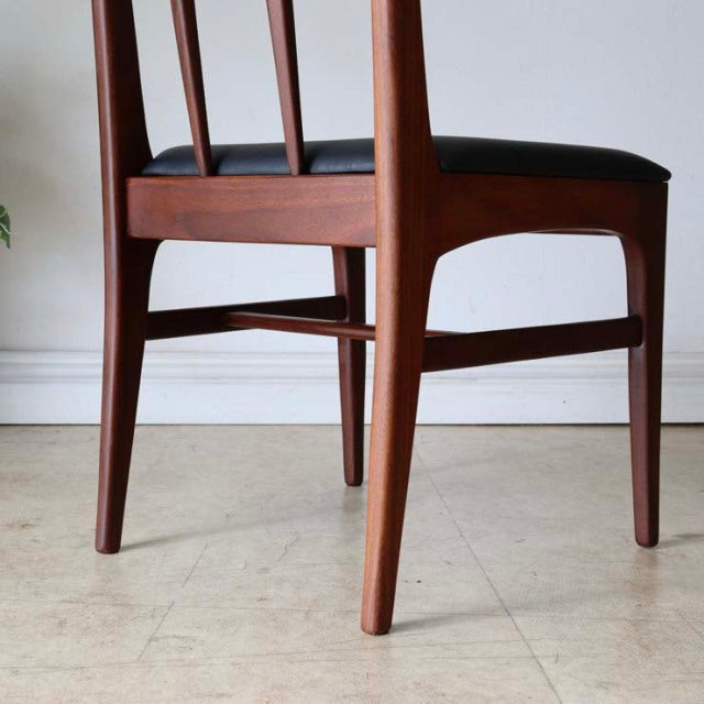 Set of four vintage mid-century teak dining chairs by A.Younger Ltd., sleek British design with slender tapered legs and.