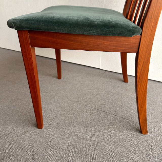 Mid-century British G-Plan chair with teak frame, tapered legs, and dark green vintage-style upholstered seat.