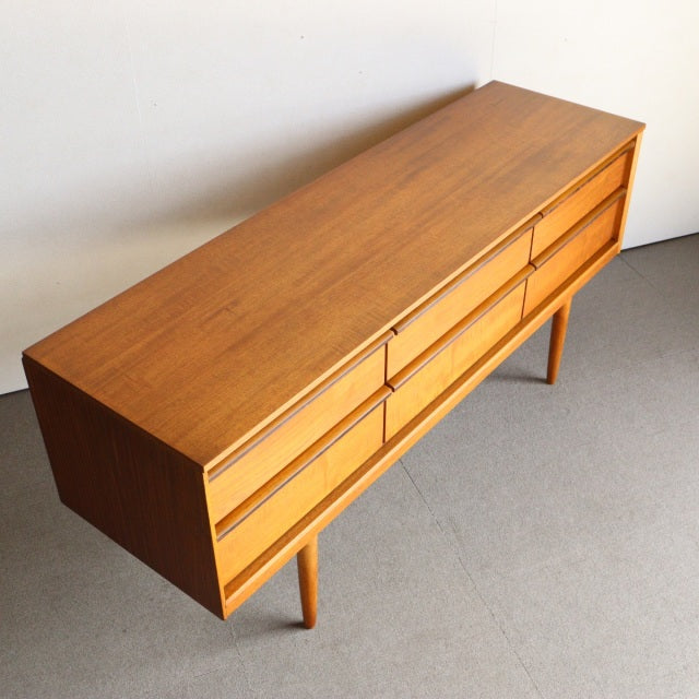 Mid-century vintage teak sideboard by Austinsuite, British-Denmark design with rich wood grain and tapered legs.