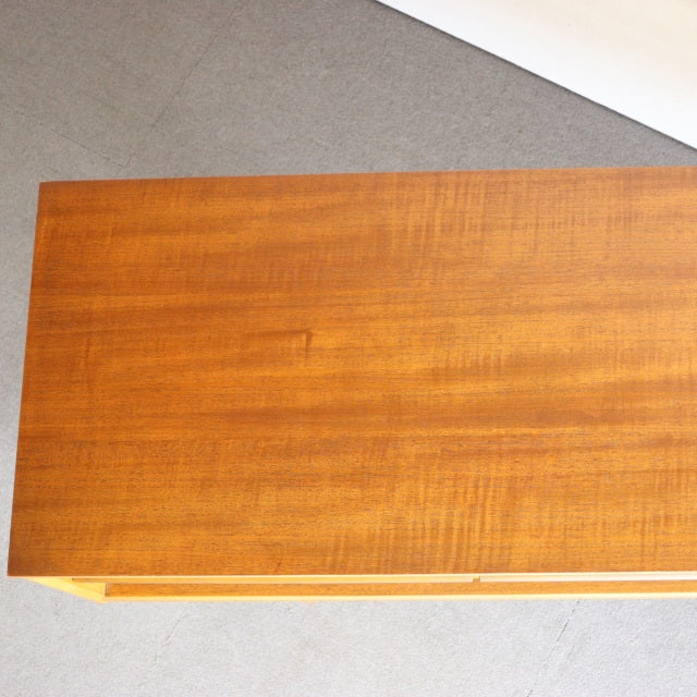 Mid-century British vintage teak sideboard by Austinsuite with rich wood grain and minimalist form.