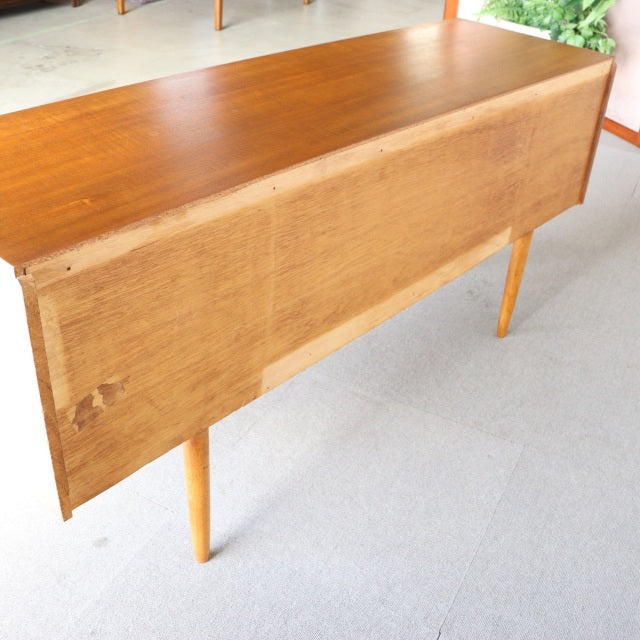 Vintage mid-century teak sideboard by Austinsuite with smooth wood grain and slender tapered legs, British-Denmark style.