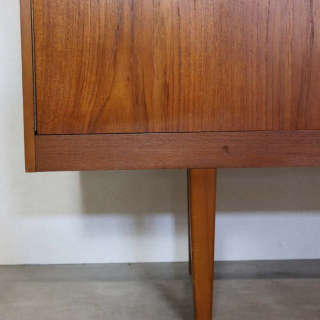 Mid-century British vintage teak sideboard leg with distinctive wood grain and clean lines.