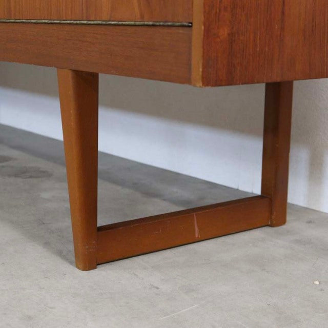 Mid-century British vintage teak sideboard leg with a unique rectangular wooden frame and visible wood grain.