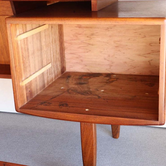 Vintage teak G-PLAN mid-century British desk compartment showcasing rich wood grain and tapered legs from Denmark design era.