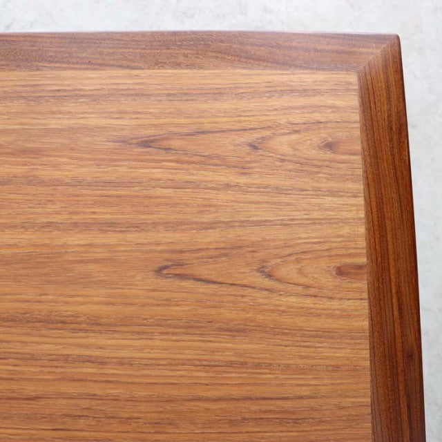 Mid-century British vintage teak dining table with rectangular top and smooth wood grain from G-PLAN.