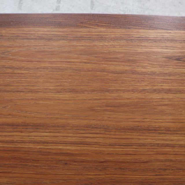 Vintage British G-Plan mid-century teak dining table top showing rich wood grain and smooth rectangular surface.