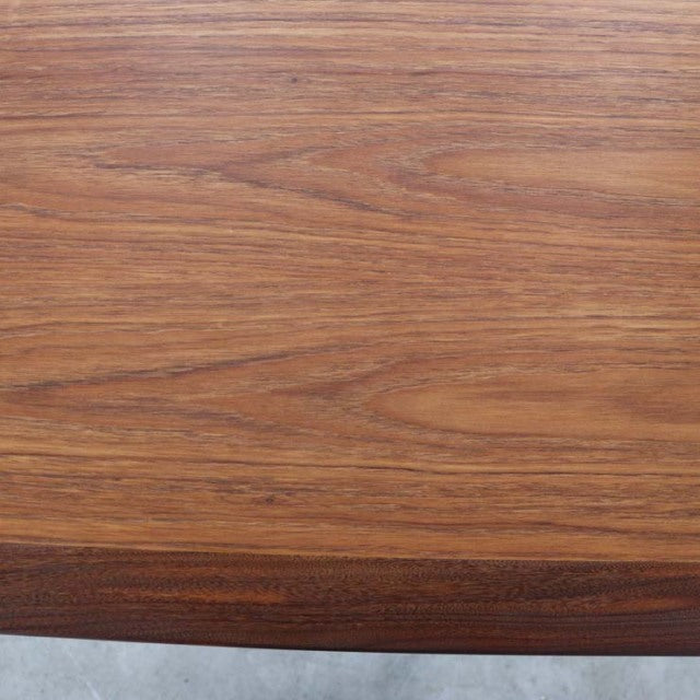 Vintage teak dining table top with rich grain and smooth finish, British mid-century style.