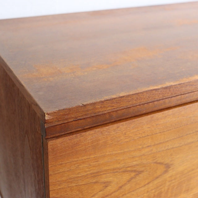 Mid-century British teak sideboard by William Laurence with rich wood grain and clean edges.