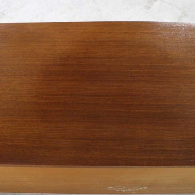 Vintage teak mid-century British G-Plan sideboard top showing rich wood grain and warm finish.