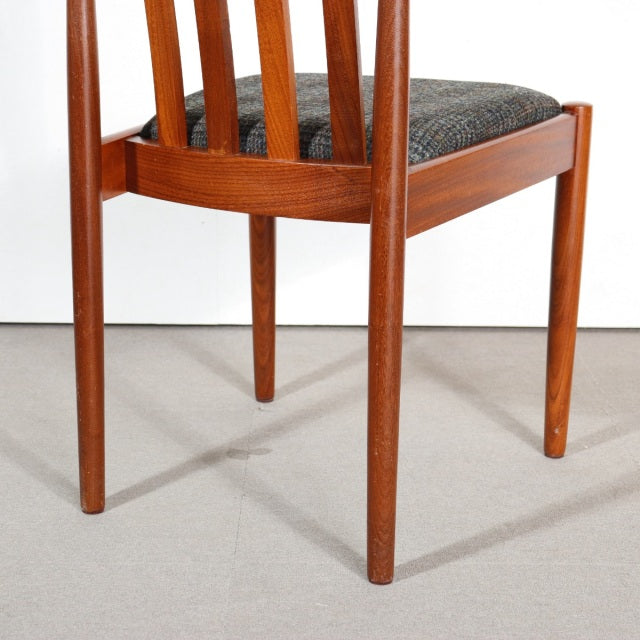 Vintage teak mid-century British dining chair by MEREDEW with tapered legs and vertical slat back.